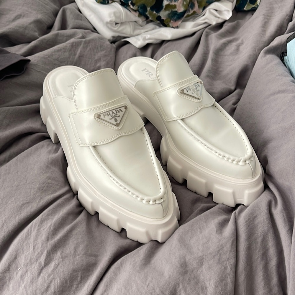 Trendy white slip ons